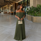 "Ingrid - Φόρεμα με Ανοιχτούς Ώμους και Ροή" can be rewritten as: "Ingrid - Φόρεμα με Ανοιχτούς Ώμους και Ρομαντική Ροή".