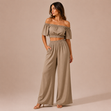 Ισα - Σετ crop top με ανοιχτούς ώμους και παντελόνι palazzo" 

Rewritten: "Ισα - Σετ με crop top ανοιχτού ώμου και palazzo παντελόνι