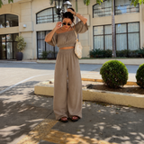 Ισα - Σετ crop top με ανοιχτούς ώμους και παντελόνι palazzo" 

Rewritten: "Ισα - Σετ με crop top ανοιχτού ώμου και palazzo παντελόνι