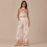 Valeria - Σετ με τροπικό σχέδιο, halter crop top και παντελόνι palazzo
